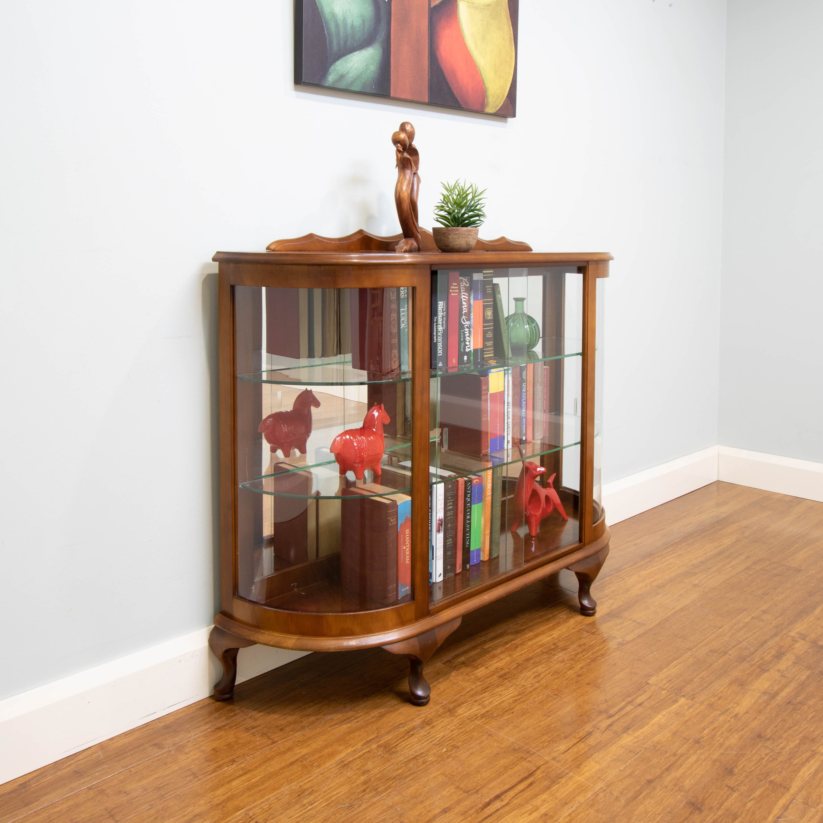 Vintage curved glass curio cabinet